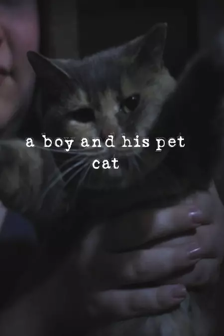 a boy and his pet cat