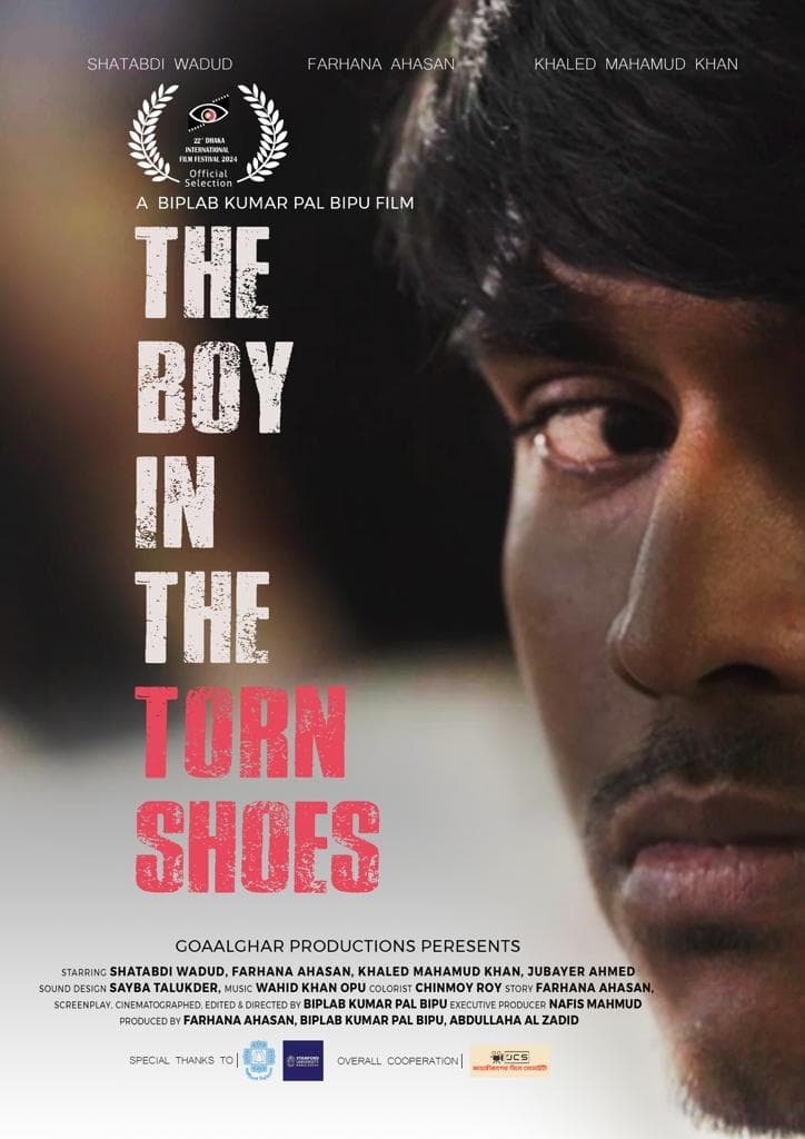The Boy in The Torn Shoes