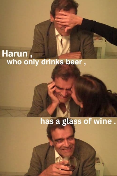 Harun, who only drinks beer, has a glass of wine (2011).